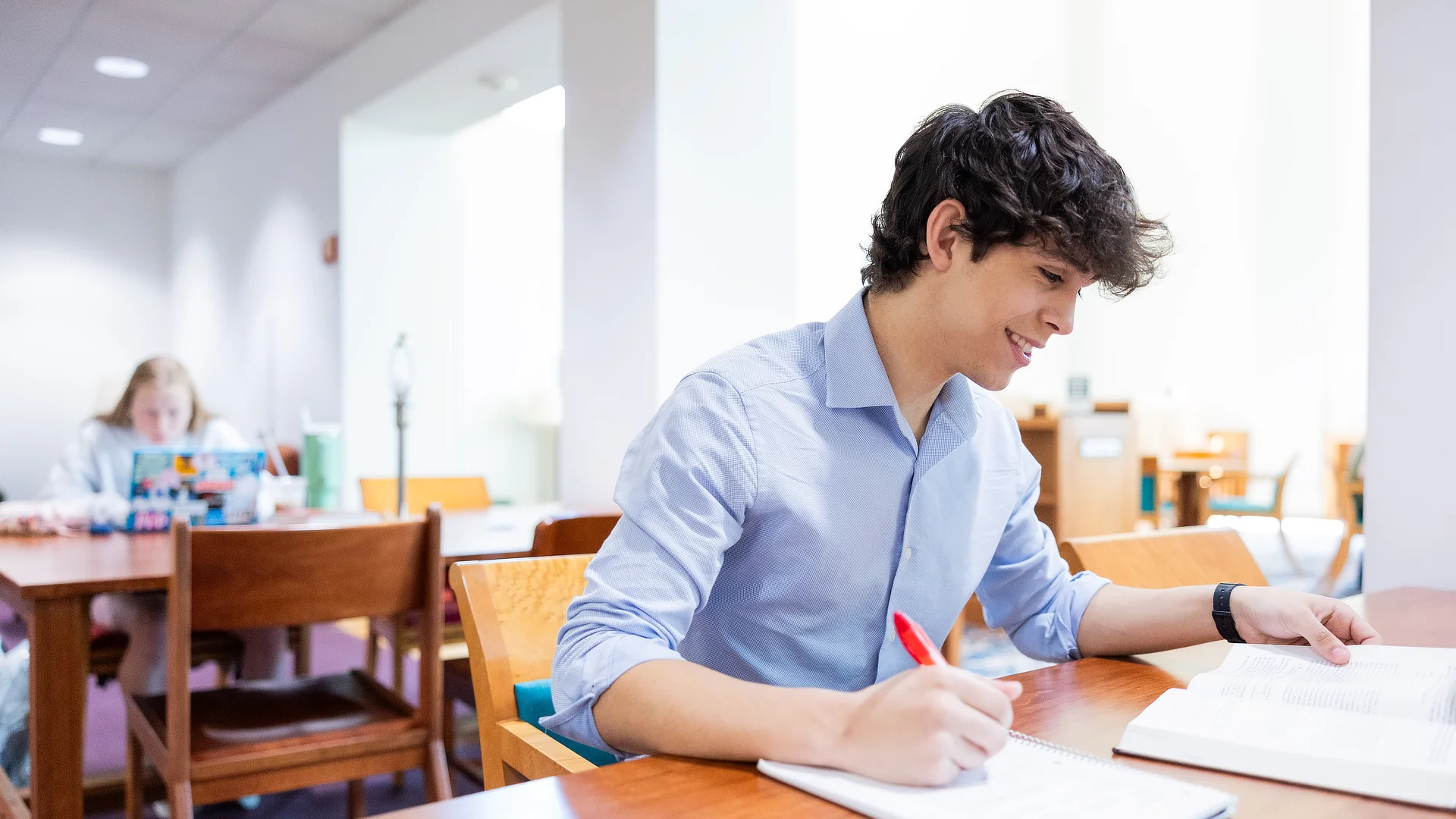 Student with Notebook
