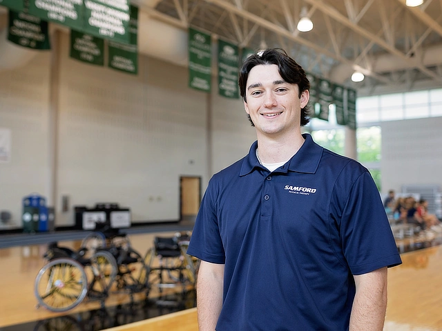 male student in a gym