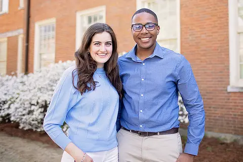 Male And Female Alumnae On Campus