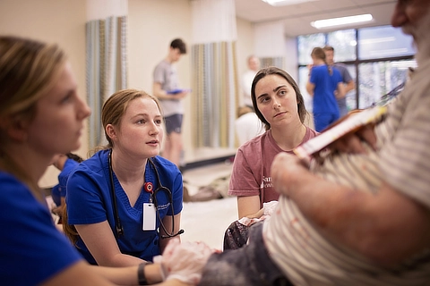 health students with patient