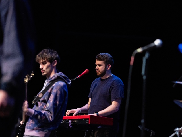 Briggs Cooper playing keyboard in a Lakeshore Concert