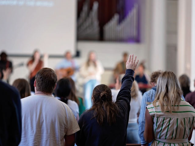 People worshiping in Reid Chapel