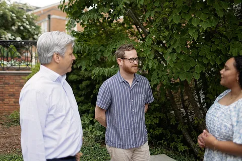 Three People Talking