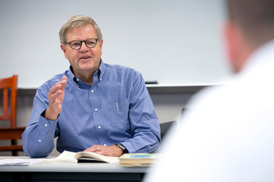 Beeson professor teaching class.