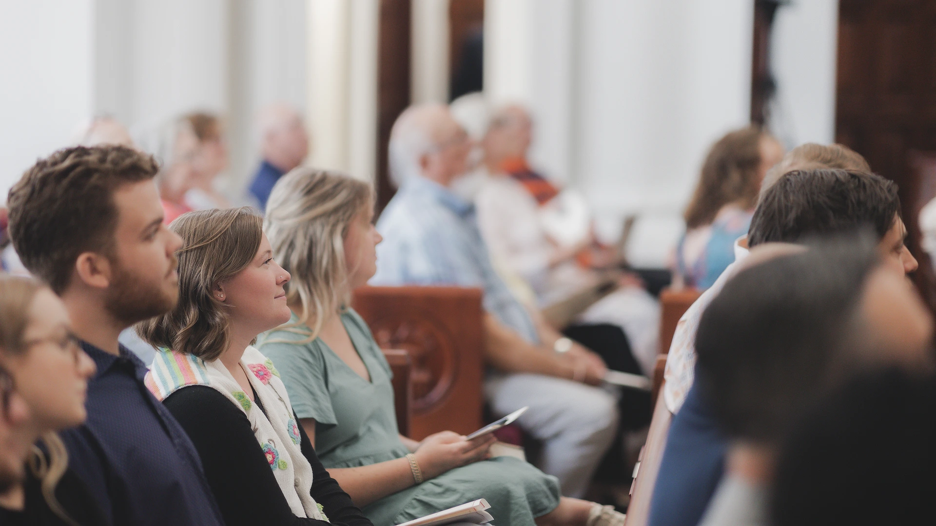 students sitting in hodges chapel
