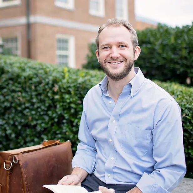 student sitting on a bench