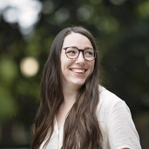 female divinity student outside