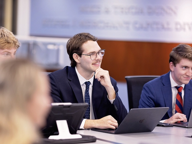 Male student with laptop