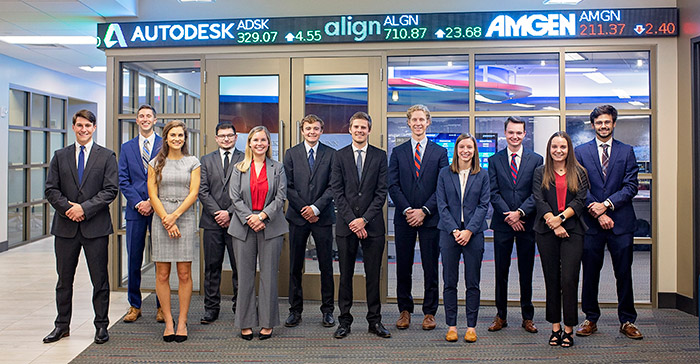 Photo of students in front of management room