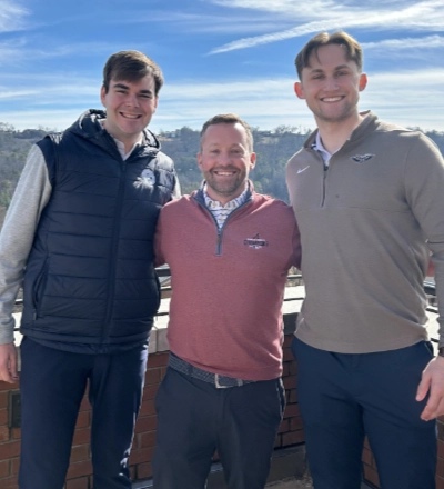 male mentor with two male mentees