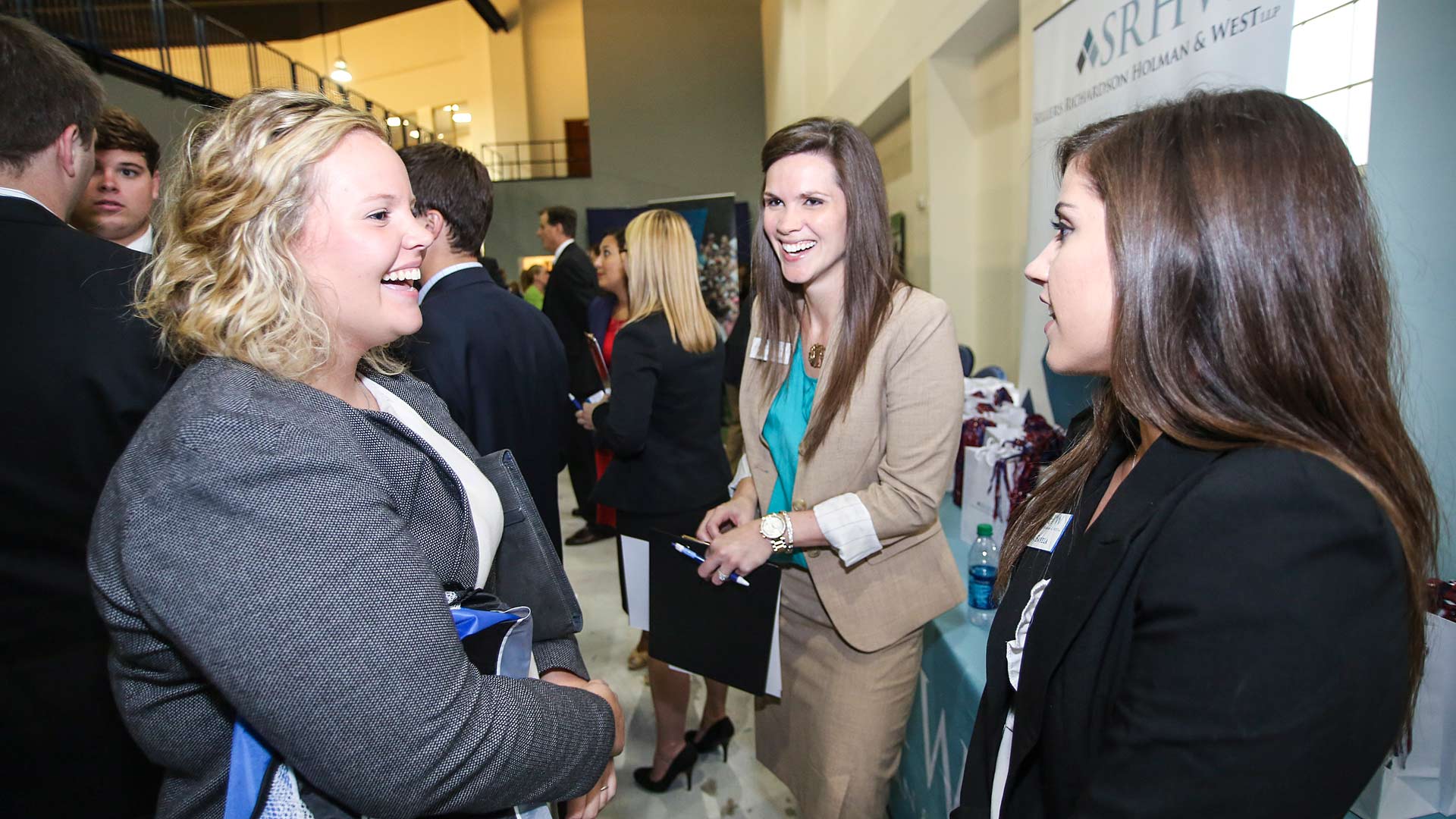 Student Talking with Employers