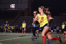 female student running for a touchdown