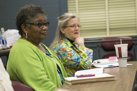 Two female students attending evening studies