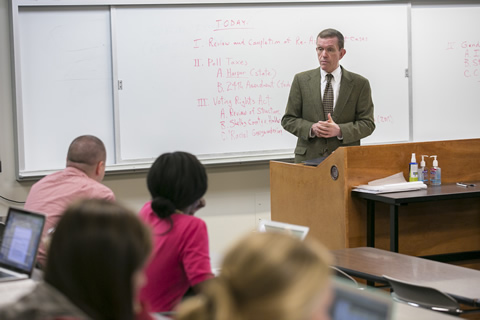 male professor lecturing