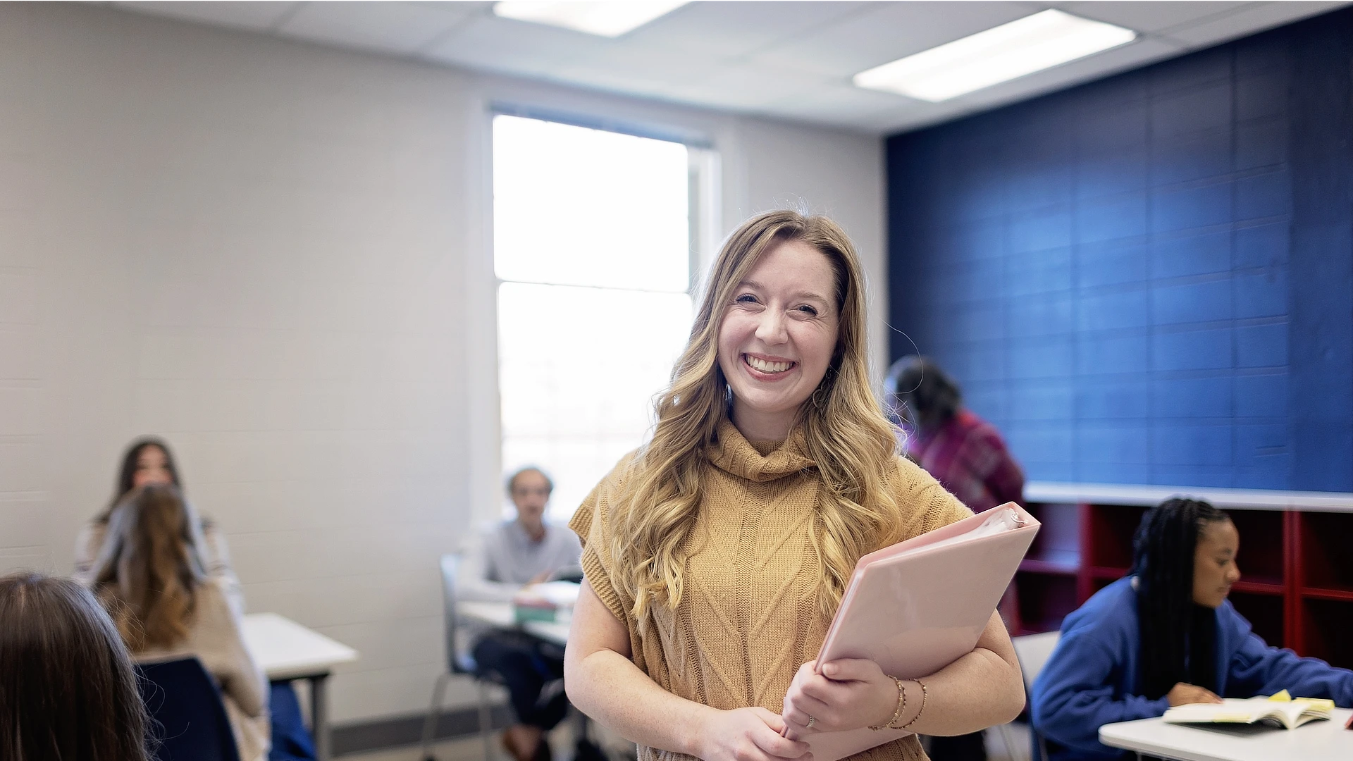 female teacher with papers