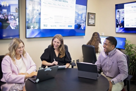 three business students at table DR10042022022