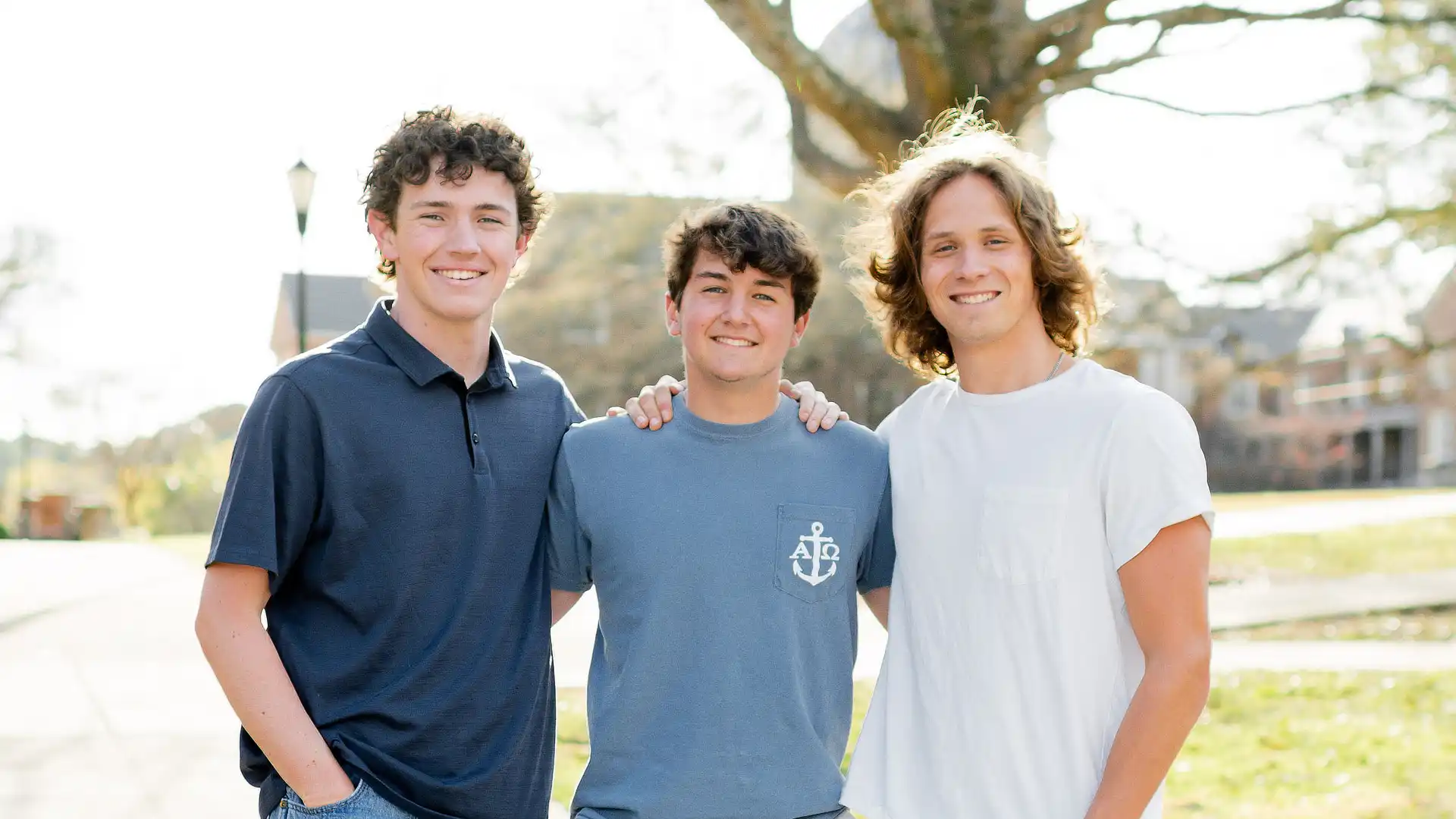 three fraternity men