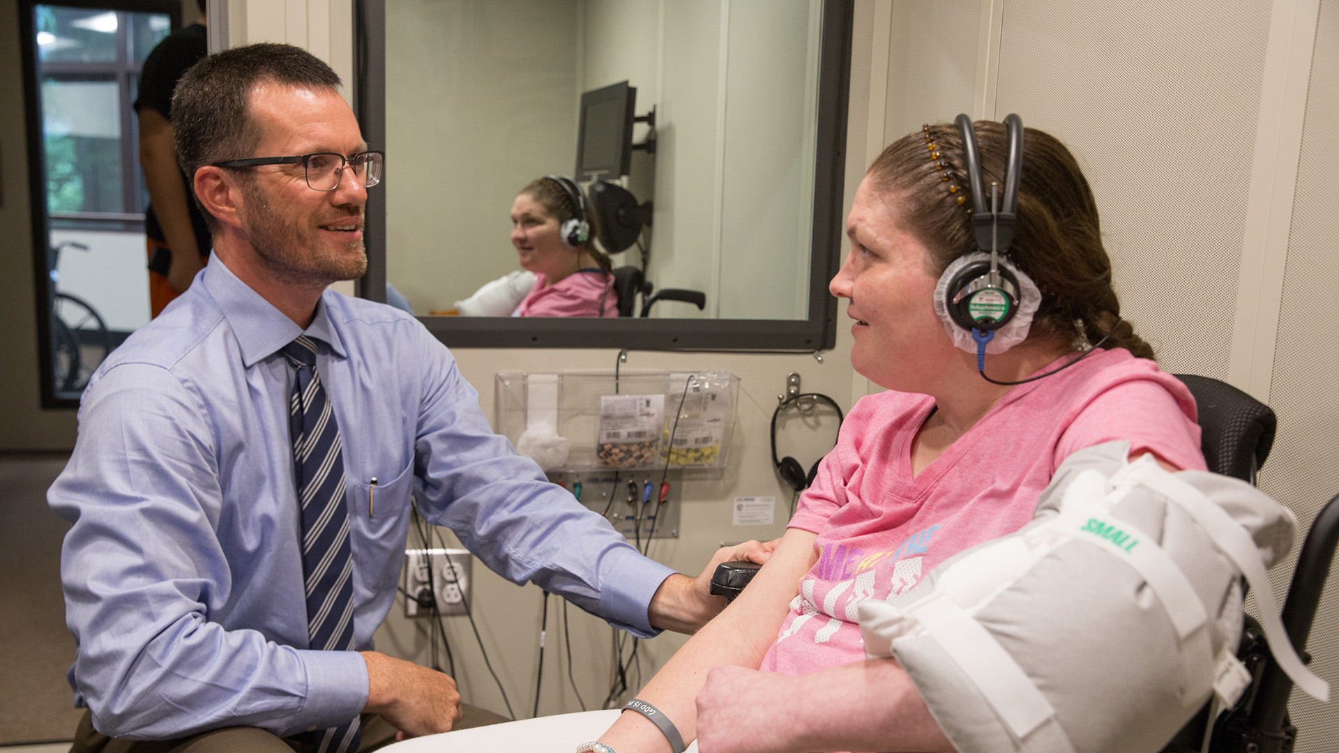 Mag Audiology Professor in Booth