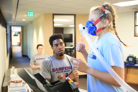 Students testing oxygen intake SD08190830