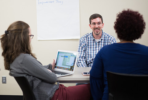 Student and professor in classroom lab