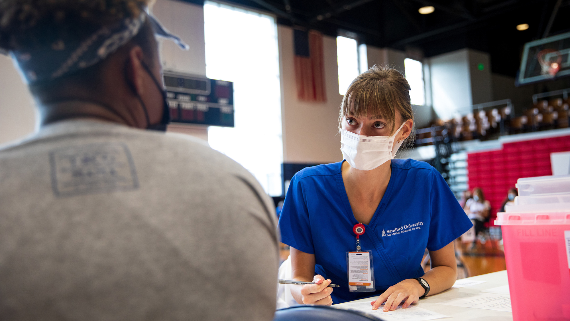 Nursing student at vaccine clinic header