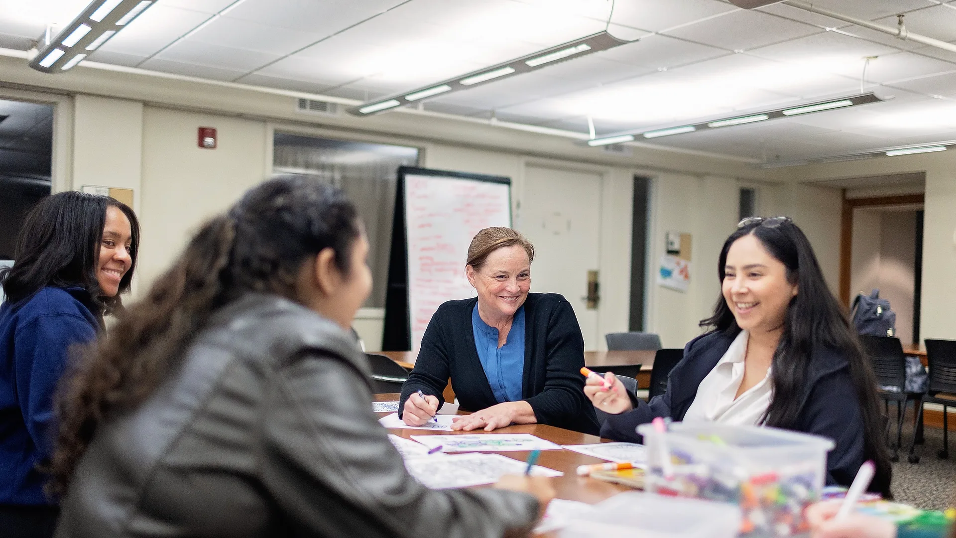 four female law students drawing