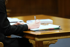 woman writing in notebook