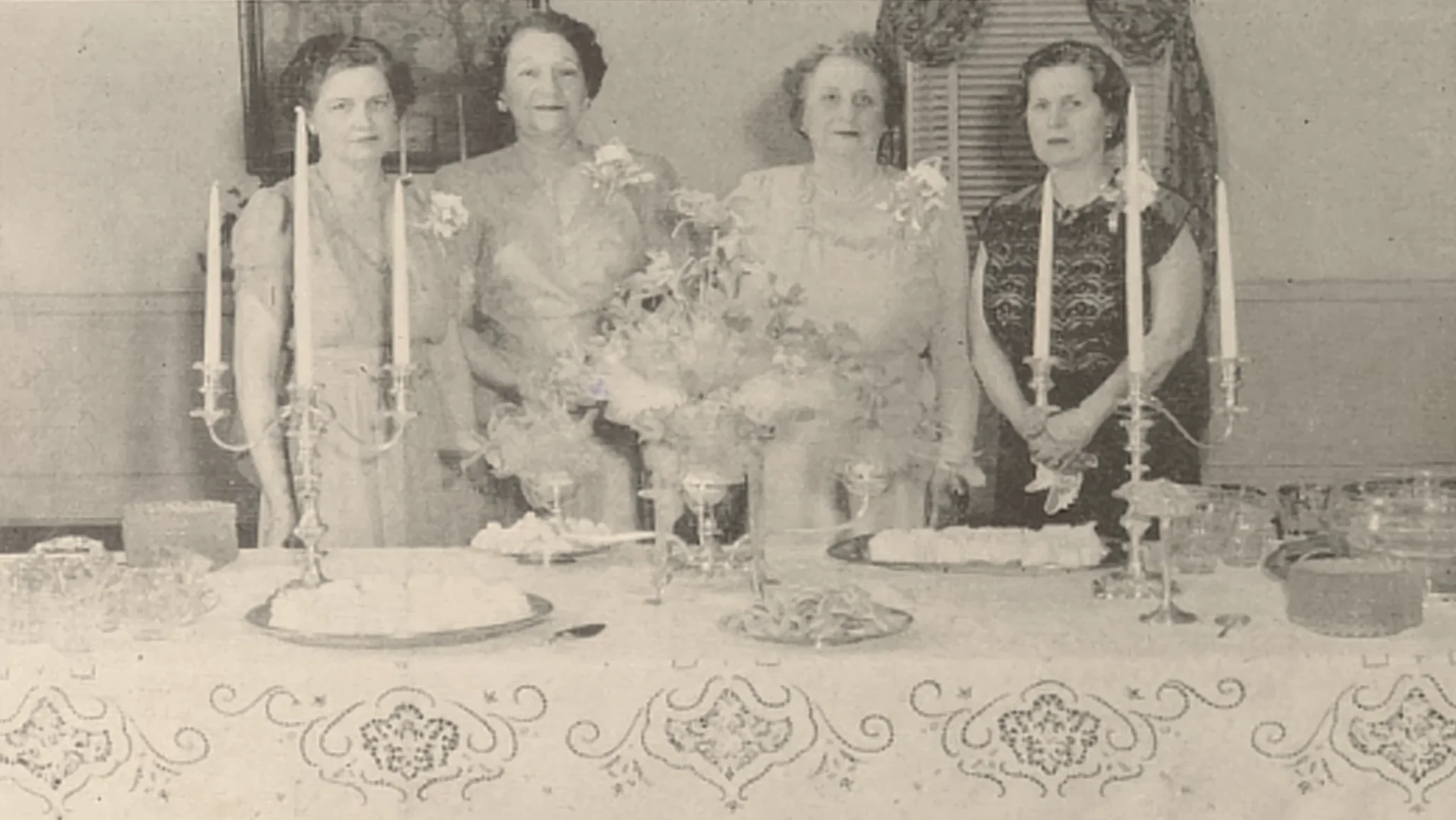 Four Women Behind Dessert Table