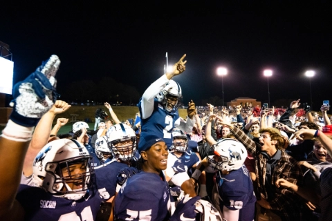 Samford football players celebrating