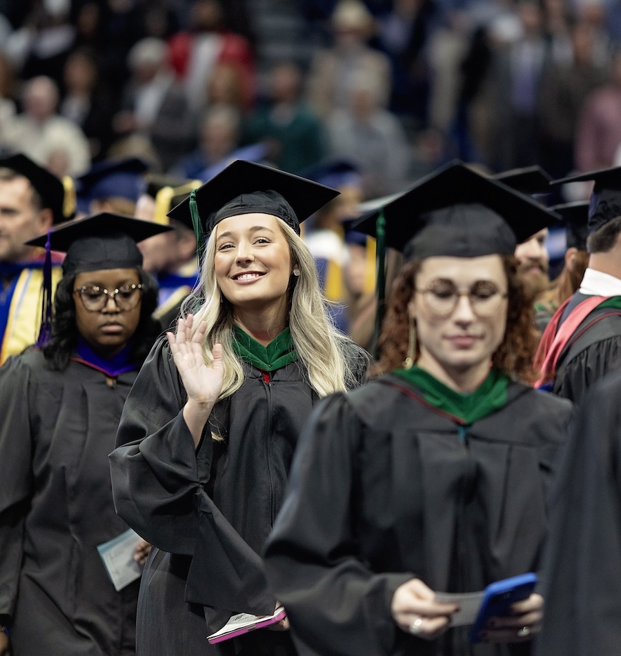 Samford grad waving