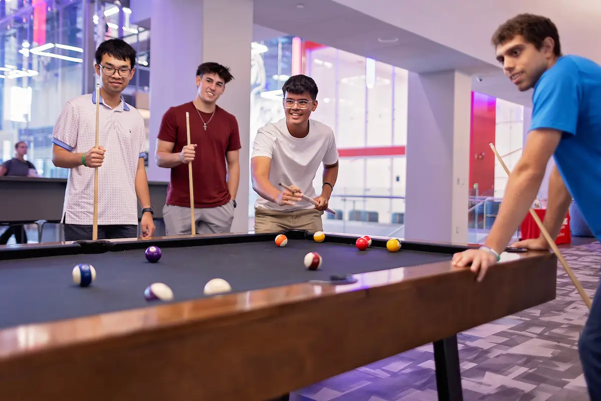 Blake Andreas playing pool