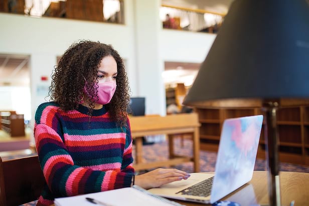 Education Student in the Library