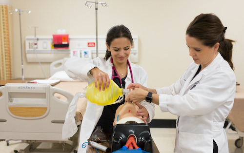 Nursing students practicing