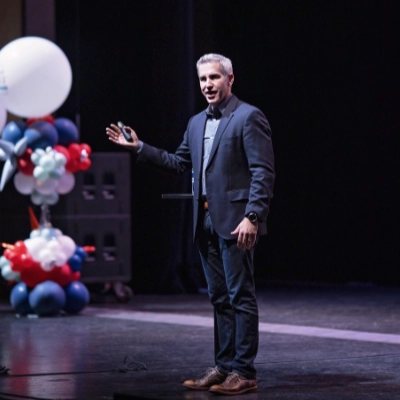 Jon Acuff speaking at event