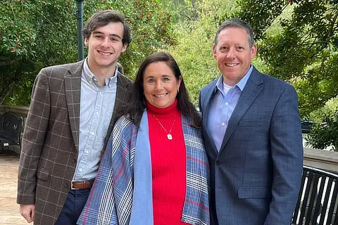 Parents and Student Standing Together Outside