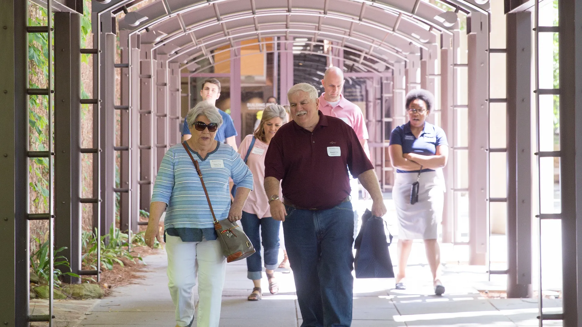 two grandparents walking in chs