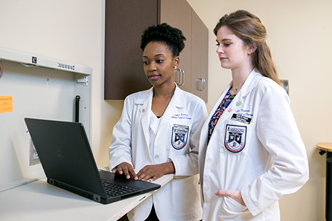 Female Students with Laptop