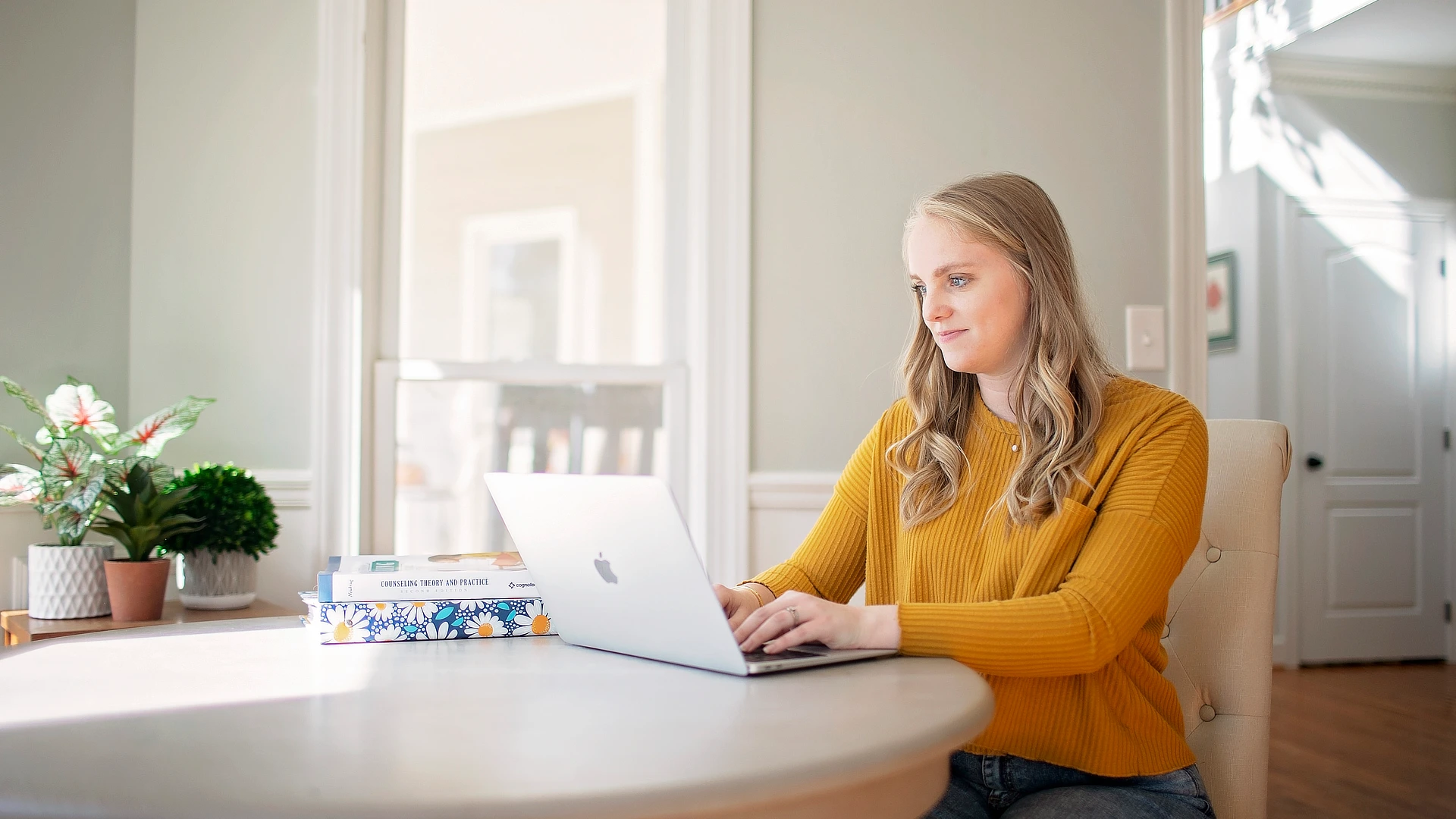 female student sitting at a table