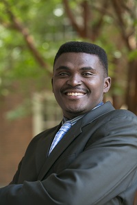 headshot of Adedoyin Christson