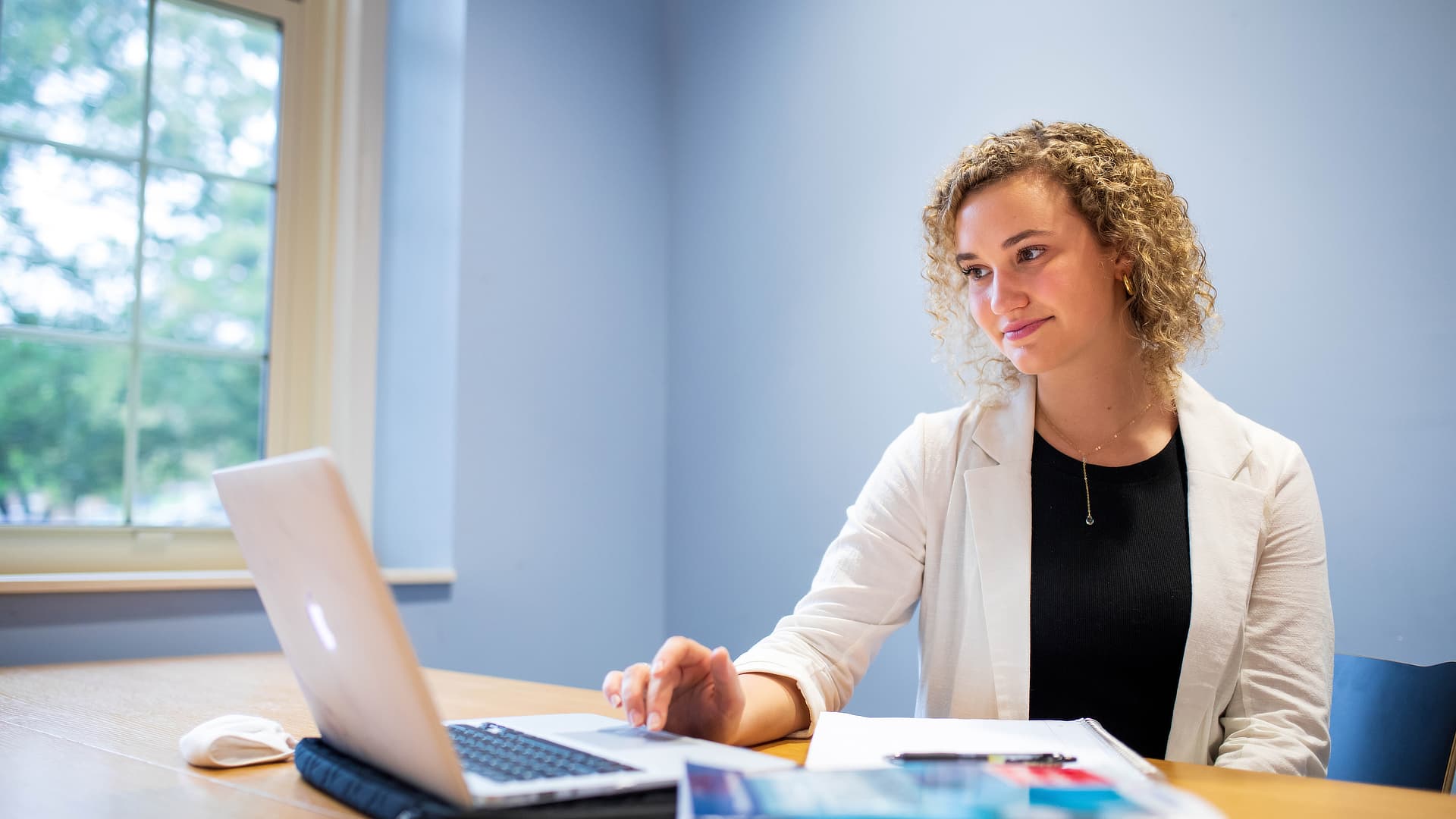 female public health student at keyboard SD1120443